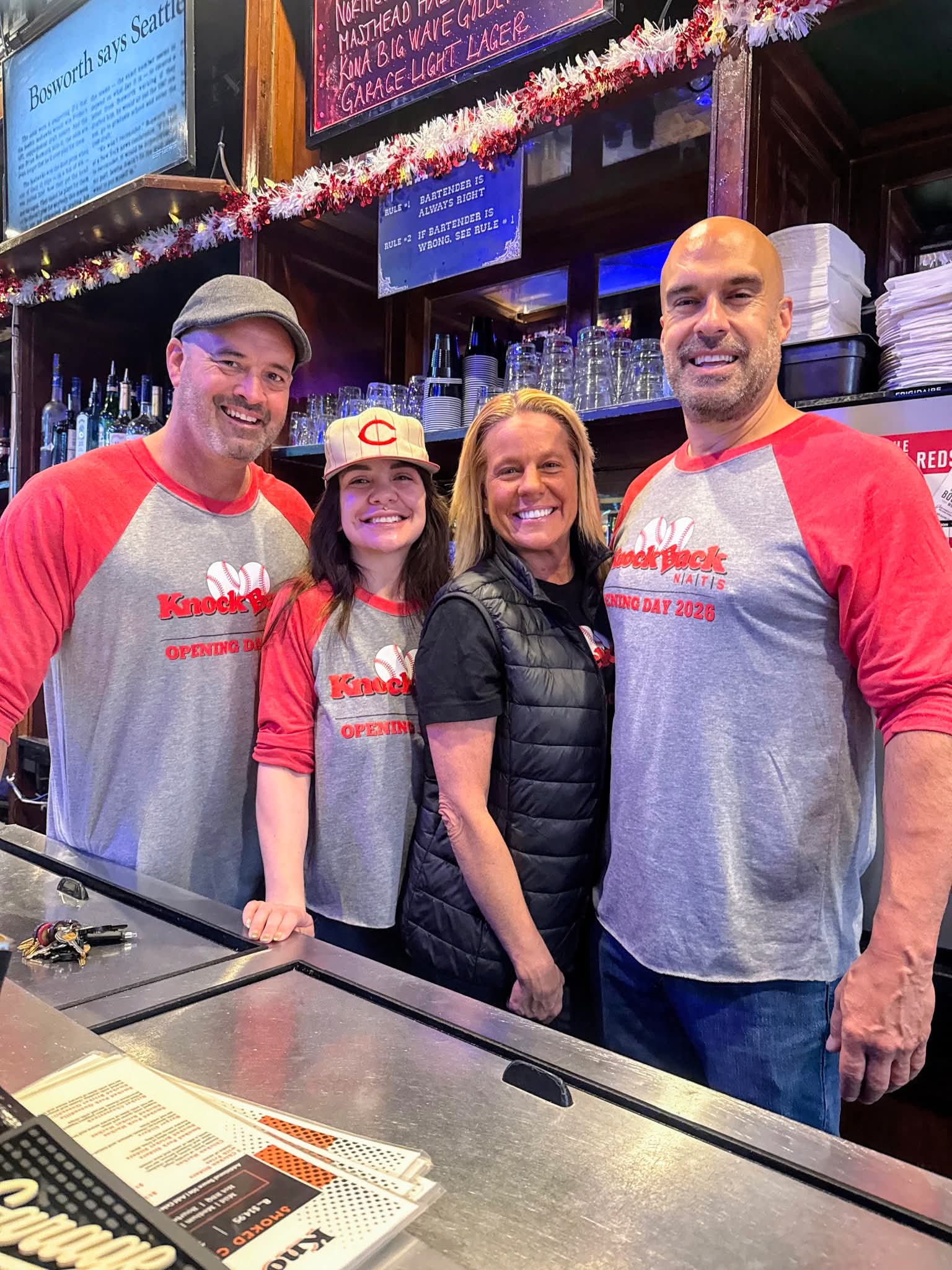 Staff behind the bar celebrating Opening Day