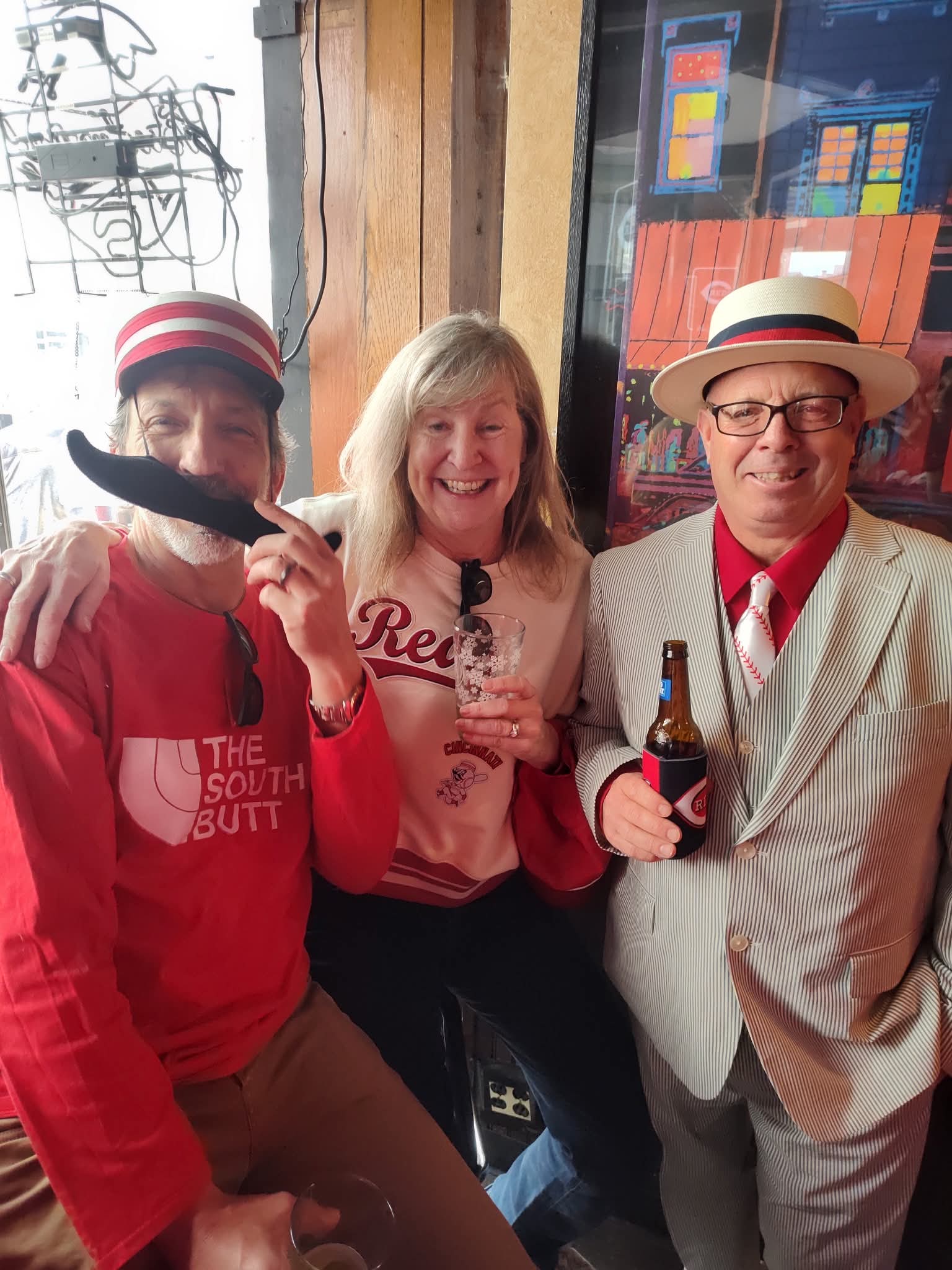 Friends posing together at the bar